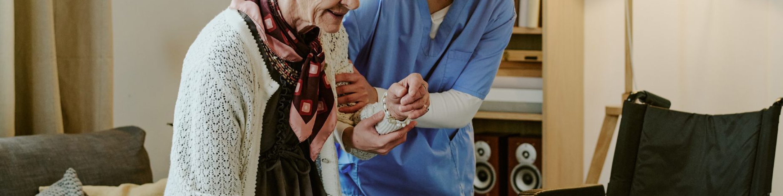 caregiver with senior at home
